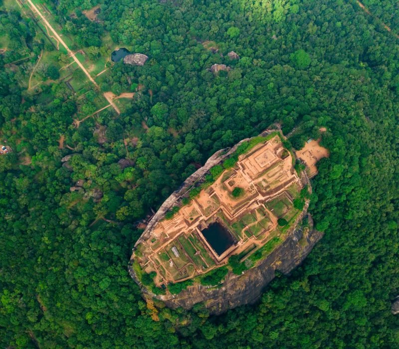 Aerial view of Sigiriya rock at misty morning, Sri Lanka. Drone footage