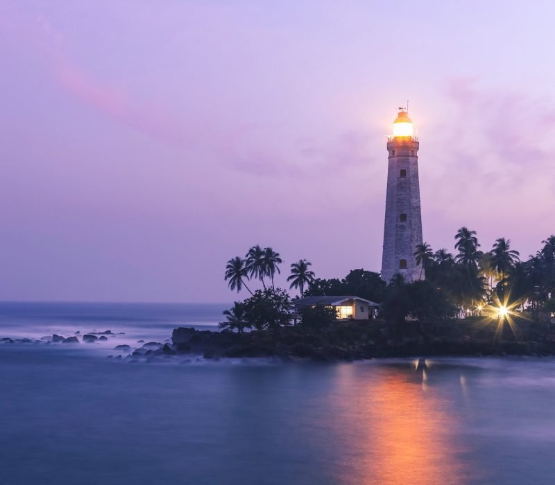 Enchanting illuminated lighthouse on Sri Lankan coast